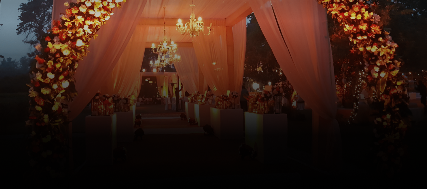 A wedding venue lit up in the evening